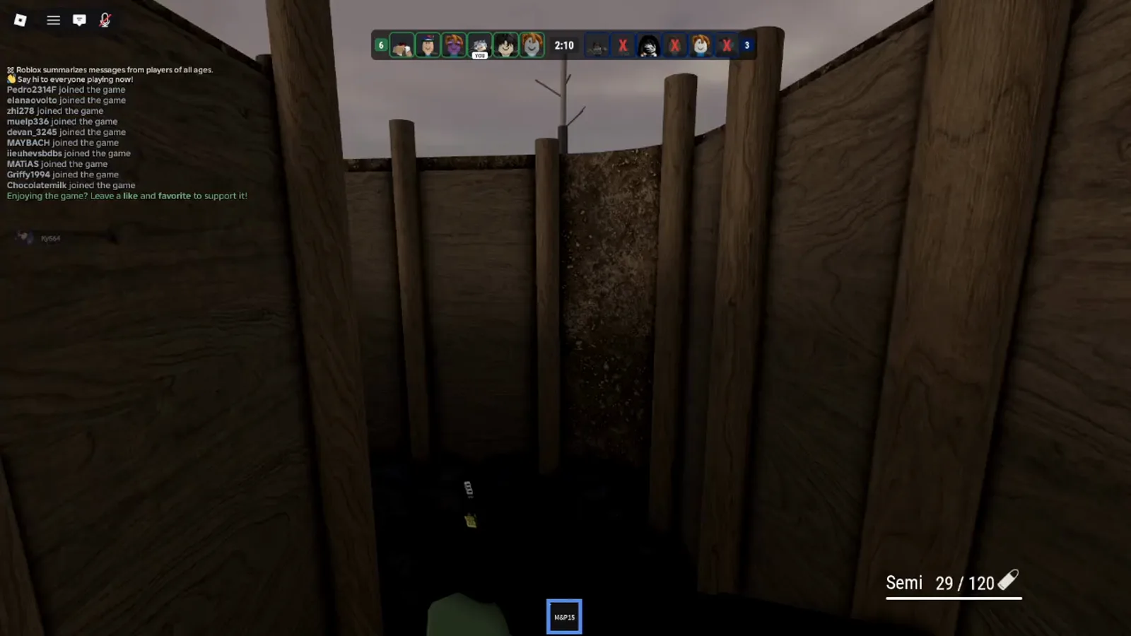 Realistic Home Defense trench map wooden log walls frame a narrow sightline while the HUD shows an M&P15 semi-auto at 29 of 120 rounds.